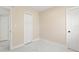 Simple bedroom with double closet doors and neutral paint at 4333 Arch St, Orlando, FL 32808