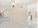 Bright bedroom featuring stylish chandelier, modern flooring, closet with mirrored doors and neutral paint at 4333 Arch St, Orlando, FL 32808