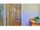 Shower featuring a built-in bench and patterned tile work at 437 Merrimac Dr, Port Orange, FL 32127