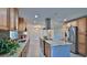 Spacious kitchen featuring granite countertops, stainless steel appliances, and plenty of cabinet storage at 437 Merrimac Dr, Port Orange, FL 32127