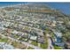 Stunning aerial view showcasing a close-knit neighborhood, with the ocean and bay nearby at 44 Sunset Blvd, Ormond Beach, FL 32176