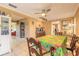 Cozy dining area with tile floors, traditional table, and seamless transition to the kitchen at 44 Sunset Blvd, Ormond Beach, FL 32176