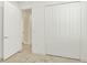 Bright hallway showing closet and entry to another room, with marble flooring at 464 Tropics Ave, Daytona Beach, FL 32124