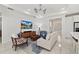 Spacious and bright living room with an open floor plan, seamlessly connecting to the kitchen at 464 Tropics Ave, Daytona Beach, FL 32124