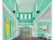 Community lobby featuring high ceilings, coastal decor, and bright, tropical colors at 464 Tropics Ave, Daytona Beach, FL 32124