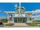 Community movie theater featuring a bright marquee and tropical-themed decor at 464 Tropics Ave, Daytona Beach, FL 32124