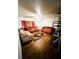 Bright living room with wood floors, a ceiling fan, and neutral walls offering versatile decor options at 5076 Fairport Ave, De Leon Springs, FL 32130