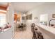 Cozy breakfast nook with a view and breakfast bar seating, great for morning meals at 6 Greenvale Dr, Ormond Beach, FL 32174