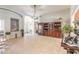 Comfortable living room with tiled floor, bright natural light, and easy access to other rooms at 6 Greenvale Dr, Ormond Beach, FL 32174