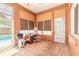 Dedicated office space with natural light and a pool view for a productive work environment at 6 Greenvale Dr, Ormond Beach, FL 32174
