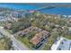 Aerial view showcasing a townhome community nearby ocean and a large bridge at 60 N Halifax Dr # 1050, Ormond Beach, FL 32176