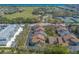Aerial shot of townhomes near a golf course with ocean views in the distance at 60 N Halifax Dr # 1050, Ormond Beach, FL 32176