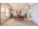 Bright dining room with a bay window, elegant chandelier, and space for entertaining at 60 N Halifax Dr # 1050, Ormond Beach, FL 32176