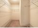 Spacious walk-in closet with wire shelving, offering ample storage space for an organized home at 60 N Halifax Dr # 1050, Ormond Beach, FL 32176
