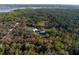 Aerial image showing outline of property for sale in trees at 600 Tabatha Dr, Osteen, FL 32764
