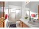 Bright bathroom with a shower-tub combination and a single sink vanity at 600 Tabatha Dr, Osteen, FL 32764