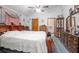 Primary bedroom features an ensuite bathroom and classic furnishings at 600 Tabatha Dr, Osteen, FL 32764