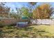 Backyard featuring an above-ground pool, a wooden fence, and ample green space for outdoor activities at 617 S Flamingo Dr, Holly Hill, FL 32117