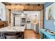 Open kitchen with a large island, modern appliances, and stylish gray cabinetry at 617 S Flamingo Dr, Holly Hill, FL 32117