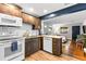 Modern kitchen with stainless steel appliances, sleek countertops, and an open layout at 617 S Flamingo Dr, Holly Hill, FL 32117