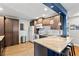 Well-equipped kitchen with granite countertops, stainless steel appliances and dark wood cabinetry at 617 S Flamingo Dr, Holly Hill, FL 32117