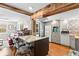 Well-appointed kitchen with a large island, stainless steel appliances, and open layout to the living room at 617 S Flamingo Dr, Holly Hill, FL 32117