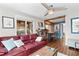 Comfortable living room with a sofa, open layout, and views to the kitchen area at 617 S Flamingo Dr, Holly Hill, FL 32117