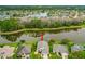 Aerial view of the home situated on a beautiful lake at 6408 Whit Ct, Port Orange, FL 32128