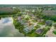 Aerial view of the home situated on a tranquil lake at 6408 Whit Ct, Port Orange, FL 32128