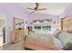 Tranquil bedroom with soft lighting and a view of the pool at 6408 Whit Ct, Port Orange, FL 32128