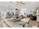 Spacious living room with neutral tones and an open floor plan at 6408 Whit Ct, Port Orange, FL 32128