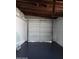 Spacious garage with a large door, providing ample parking and storage space at 761 Greenway Pl, Daytona Beach, FL 32114