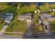 Overhead view of the property highlighting its well-manicured lawn and convenient access to the adjacent road at 902 Cloverleaf Blvd, Deltona, FL 32725