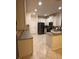 Spacious kitchen featuring granite countertops, stainless appliances, and ample cabinet space at 1812 Leather Fern Dr, Ocoee, FL 34761