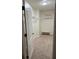 Walk-in closet with carpet, shelving, and a hanging rod for organized storage at 1812 Leather Fern Dr, Ocoee, FL 34761