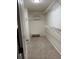 Organized walk-in closet with built-in shelving and ample storage space for clothing and accessories at 1812 Leather Fern Dr, Ocoee, FL 34761