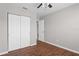 Bedroom featuring hardwood floors, fresh paint and a large closet with an easy access door at 1020 Alladin Dr, Deltona, FL 32725