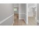 Hallway showing neutral paint and ceramic tile floors at 1020 Alladin Dr, Deltona, FL 32725