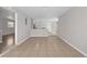 A spacious living area with tile flooring leading to kitchen at 1020 Alladin Dr, Deltona, FL 32725