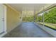 Spacious screened patio with access to the backyard at 1020 Alladin Dr, Deltona, FL 32725
