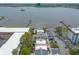 Community aerial view featuring lake views and pool at 108 Mitchell Pl # 108, Daytona Beach, FL 32118