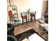 Cozy living room with bar-height seating, hardwood floors and decorative furnishings at 108 Mitchell Pl # 108, Daytona Beach, FL 32118