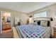 Serene main bedroom with charming decor, complemented by natural light at 112 Lacosta Ln # 115, Daytona Beach, FL 32114