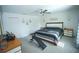 Bright bedroom featuring new carpet, ceiling fan and large windows at 1162 Prescott Blvd, Deltona, FL 32738