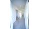 Inviting entryway with tile flooring flowing into the home and arched doorways to other rooms at 1162 Prescott Blvd, Deltona, FL 32738