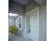 Close-up of the front door, highlighted by decorative trim and a welcoming entryway at 1162 Prescott Blvd, Deltona, FL 32738