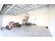 Large two-car garage with room for storage, motorcycles, and bicycles at 1162 Prescott Blvd, Deltona, FL 32738