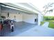 Spacious two-car garage providing ample storage and parking space, plus motorcycle and bicycles at 1162 Prescott Blvd, Deltona, FL 32738