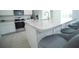Kitchen island with marble countertops and breakfast bar seating, perfect for entertaining at 1162 Prescott Blvd, Deltona, FL 32738