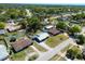 Neighborhood aerial view highlighting the homes, mature trees and nearby streets, offering a great sense of community at 1199 Galgano Ave, Deltona, FL 32725